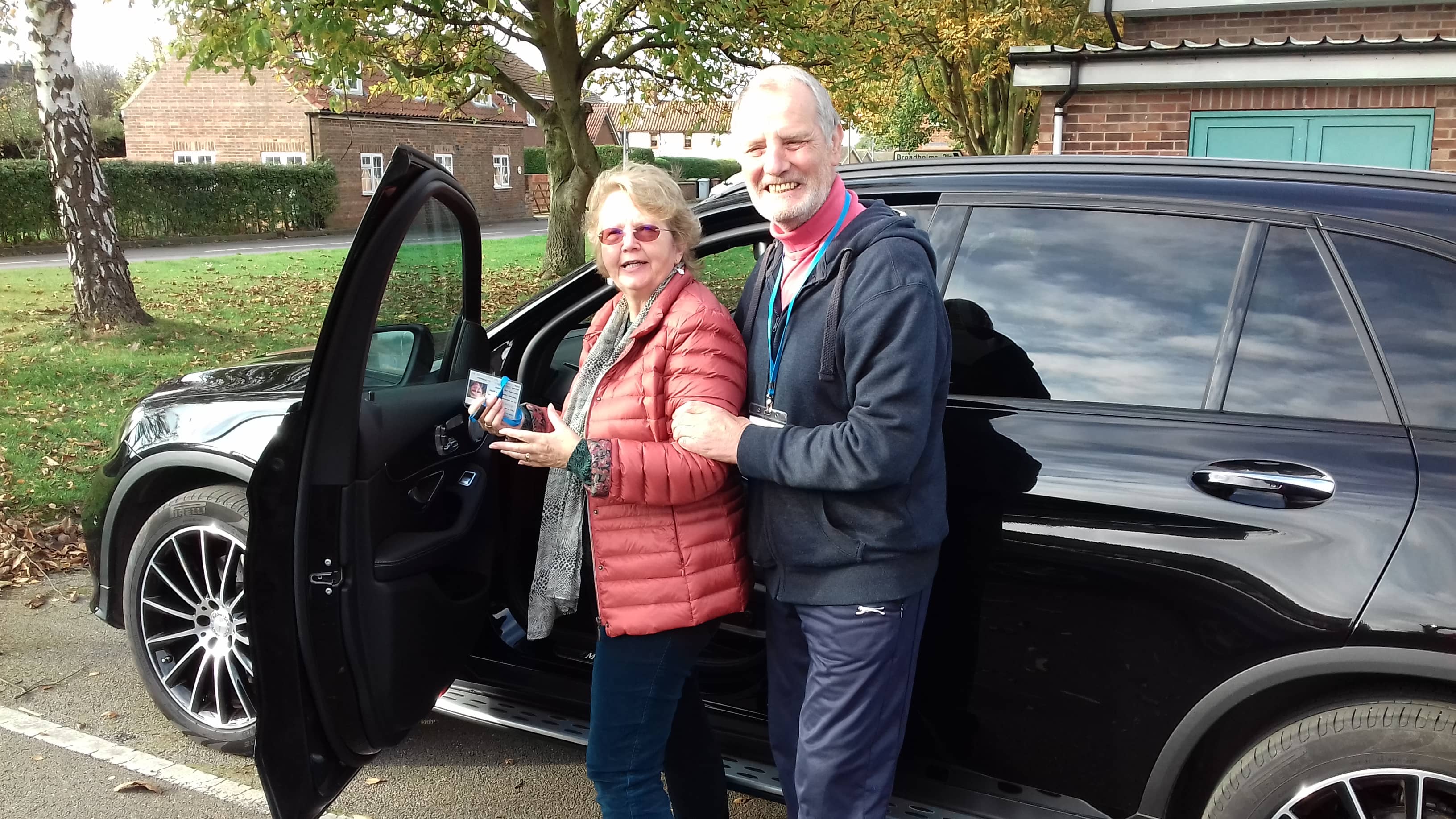 Members of the THAW team stood by one of the vehicles.